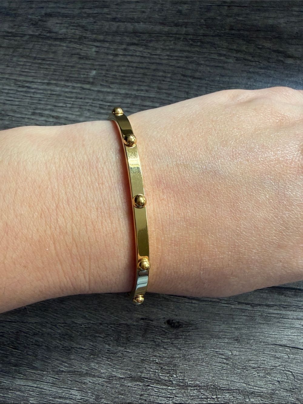 Gold plated stainless steel studded bangle bracelet